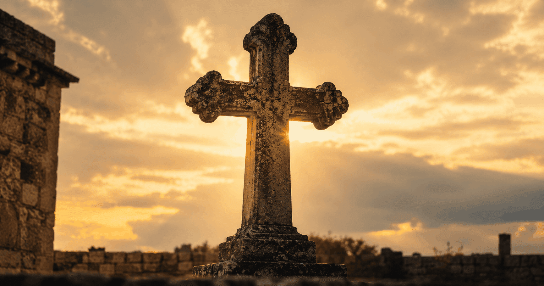 Ancient stone cross at golden hour